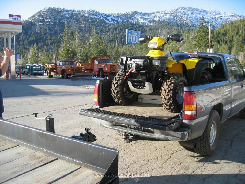 04. Step 'D' in rescuing a trailer...back 1 ATV so you can winch the trailer on another trailer..jpg