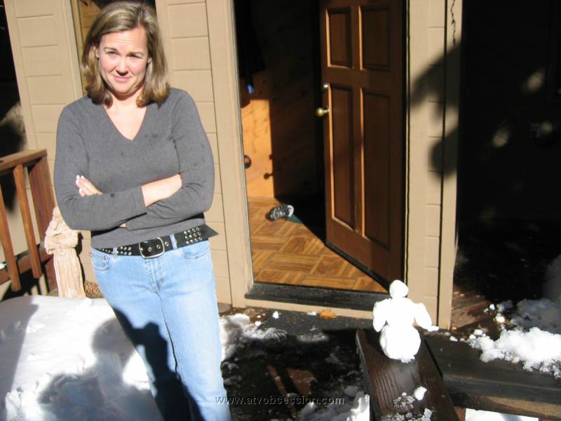 46. Miren is now amused with Larry's snow man..jpg