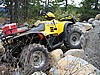 05. Ken parks his ATV on a rock to show clearance.jpg