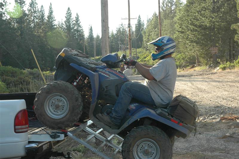 27. Anxious to get back home to his friends Chadd loads the customers quad..jpg