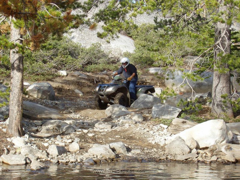 087. Chad comes to the deep water crossing near the dam..jpg