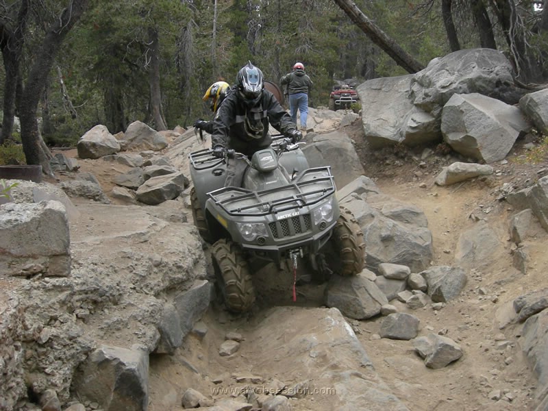 056. Wayne's got it, as Larry heads back for his turn..jpg