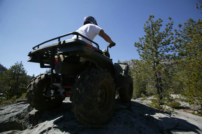 067. He's on top..notice the old tires and rims..jpg