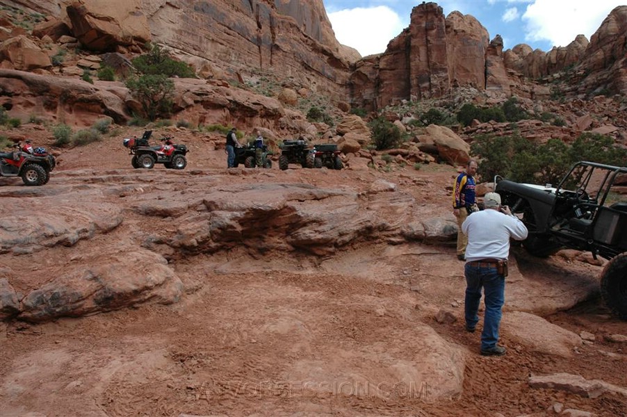055. The gang hangs out while some big rigs take a crack at it..jpg
