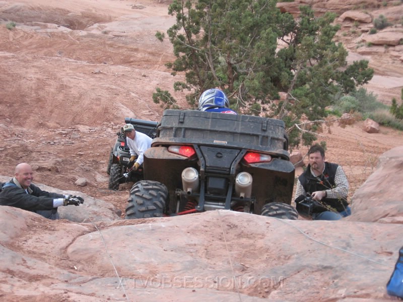 185. Larry pulls the line away from the tire..jpg