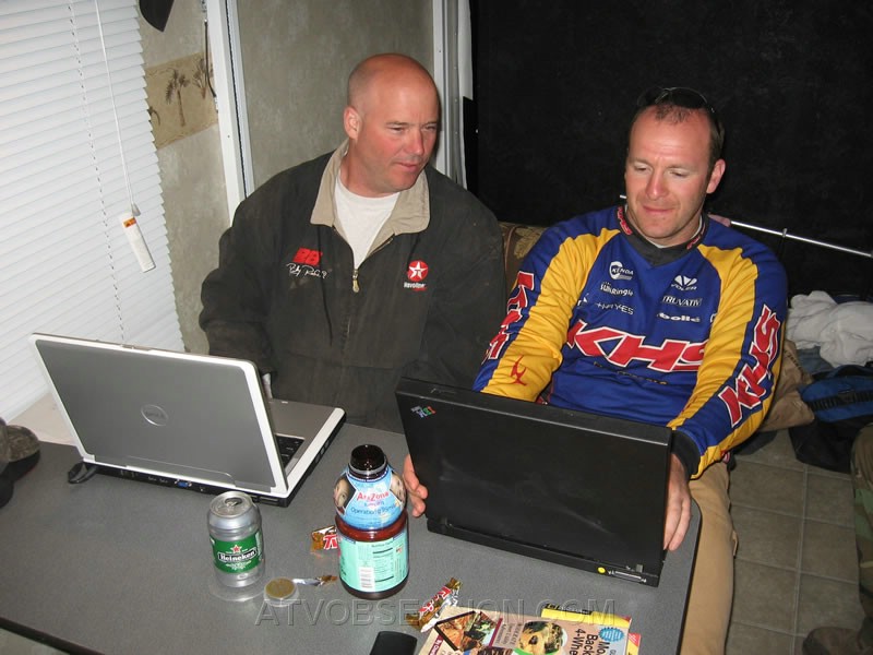 212. Back at the trailer..Larry and Dusty upload the photos to the ATVOBSESSION site..jpg