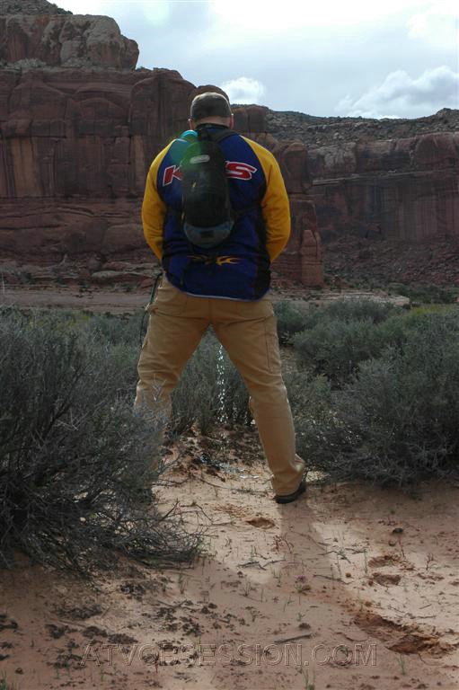 087. Dusty does his part to water the plants..jpg