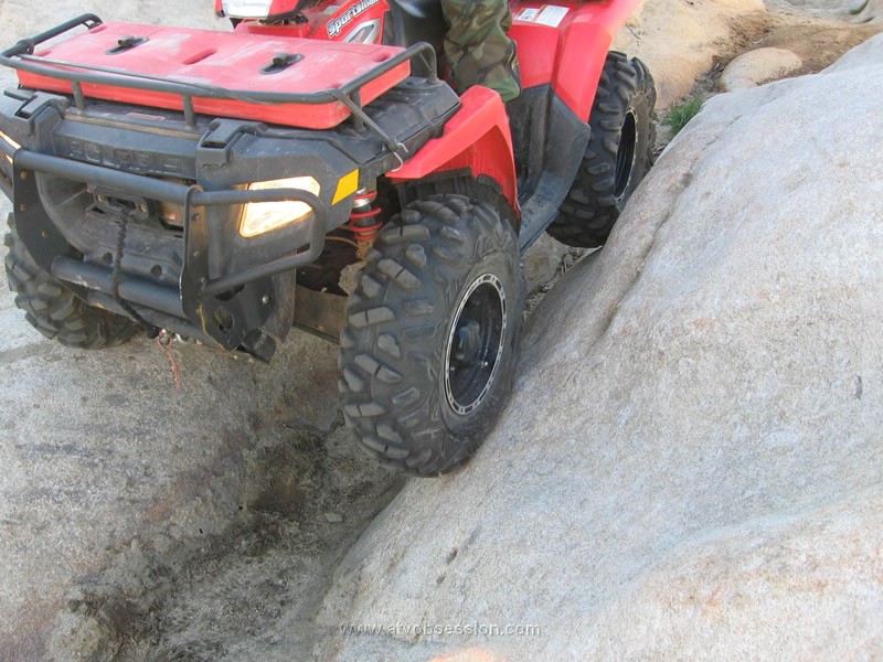 070. If you look..it's flopping over the rim to grip..jpg