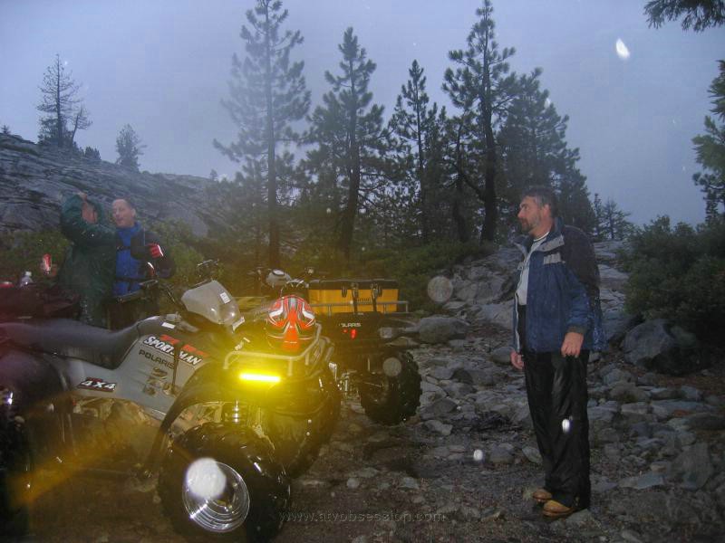 099. It's pouring.  Jack and Terry have a beer, while Dan looks like drown rat.jpg