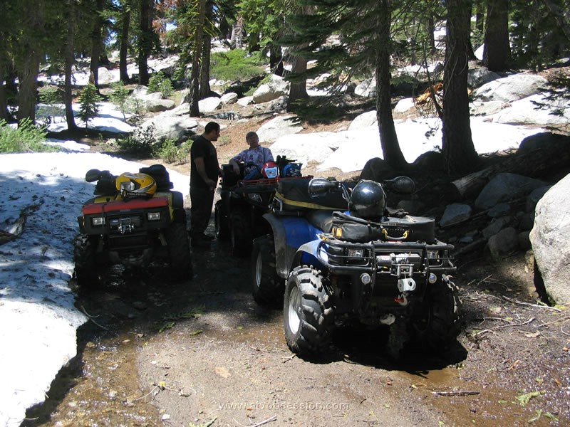 07. Taking a break in the June sun around tons of snow..jpg