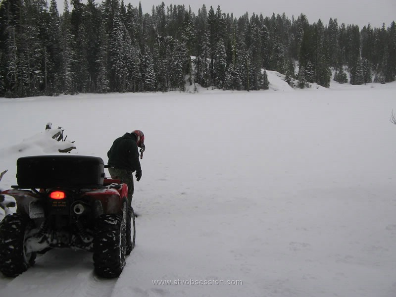 106. We go to Kelly Lake..test the ice..gouge a hole...and end up doing major doughnuts on the ice..what a blast..jpg